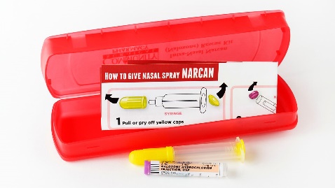 A photo of a Narcan naloxone nasal spray kit with instructions.