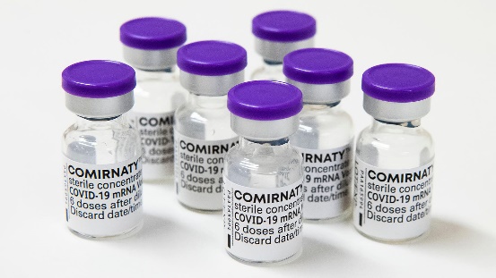 A photo of vials of Comirnaty COVID vaccine.